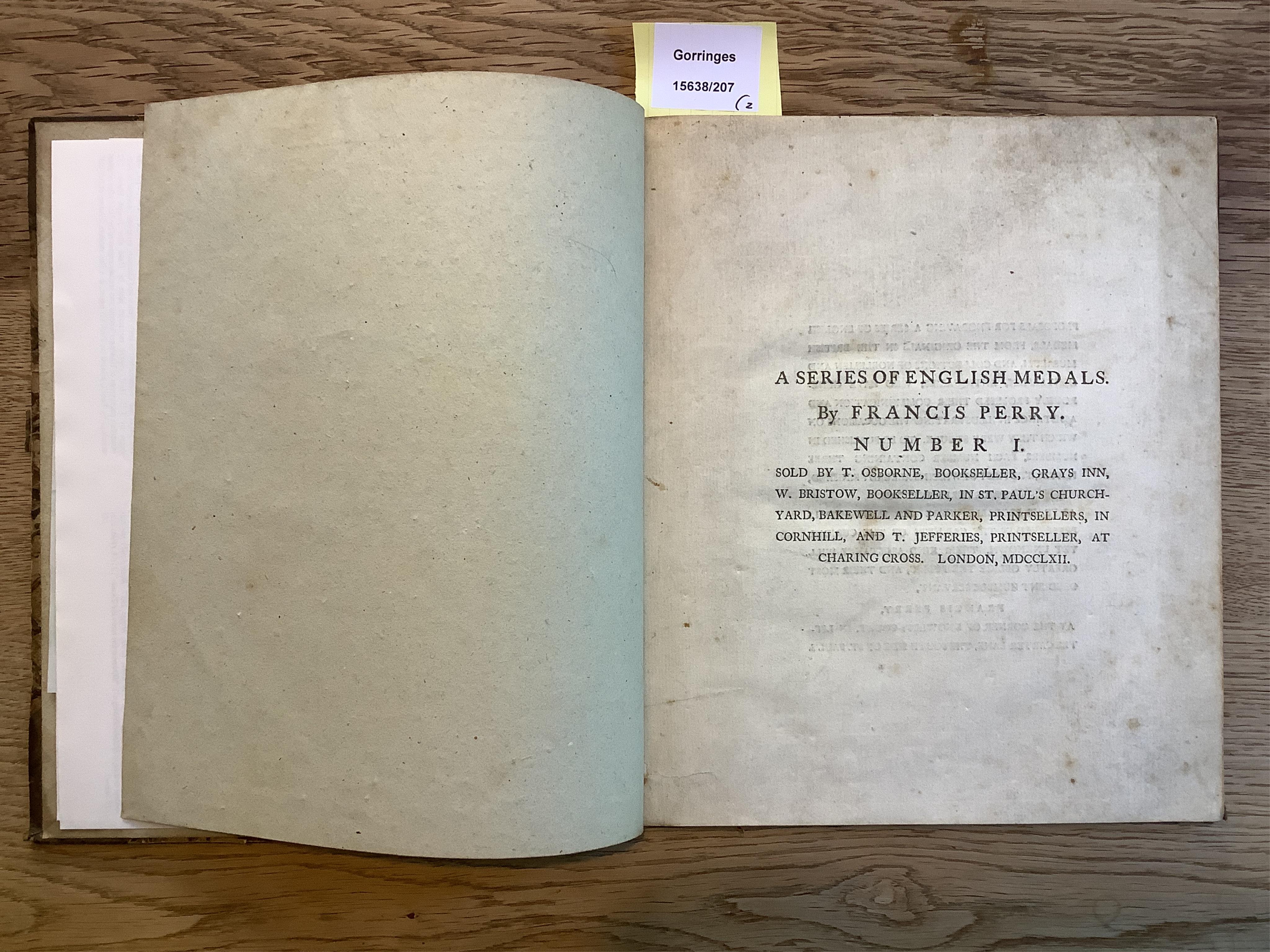 Perry, Francis. A series of English Medals, London 1762 , 4to, with the rare complimentary plates and additional plate of the Petition Crown tipped in; another copy with two supplementary plates, rebound.